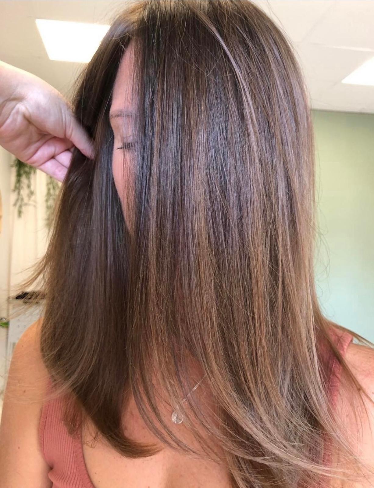 Long straight brunette with soft highlights