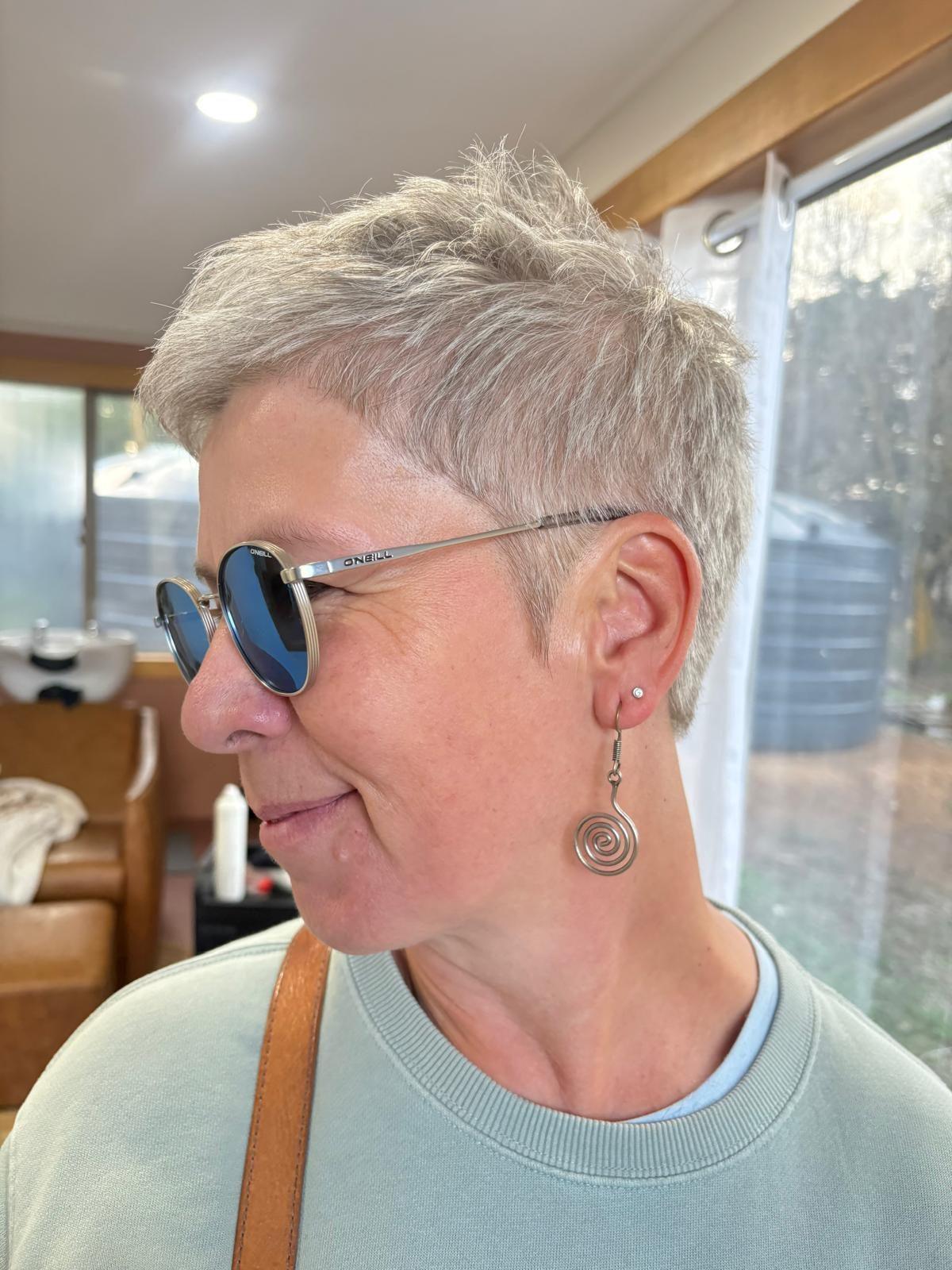 Textured silver pixie cut in the salon