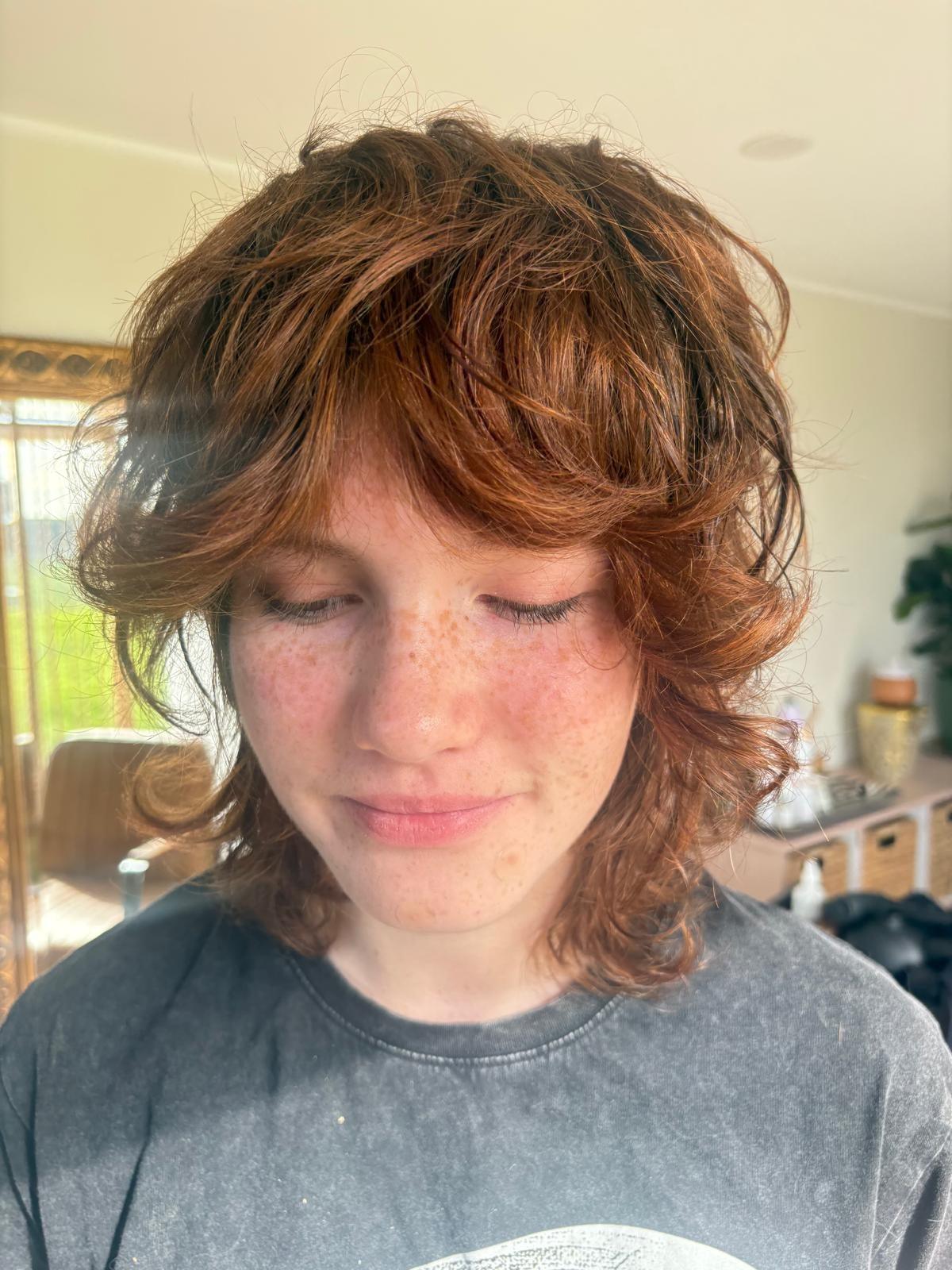 Copper curly cut with soft layers